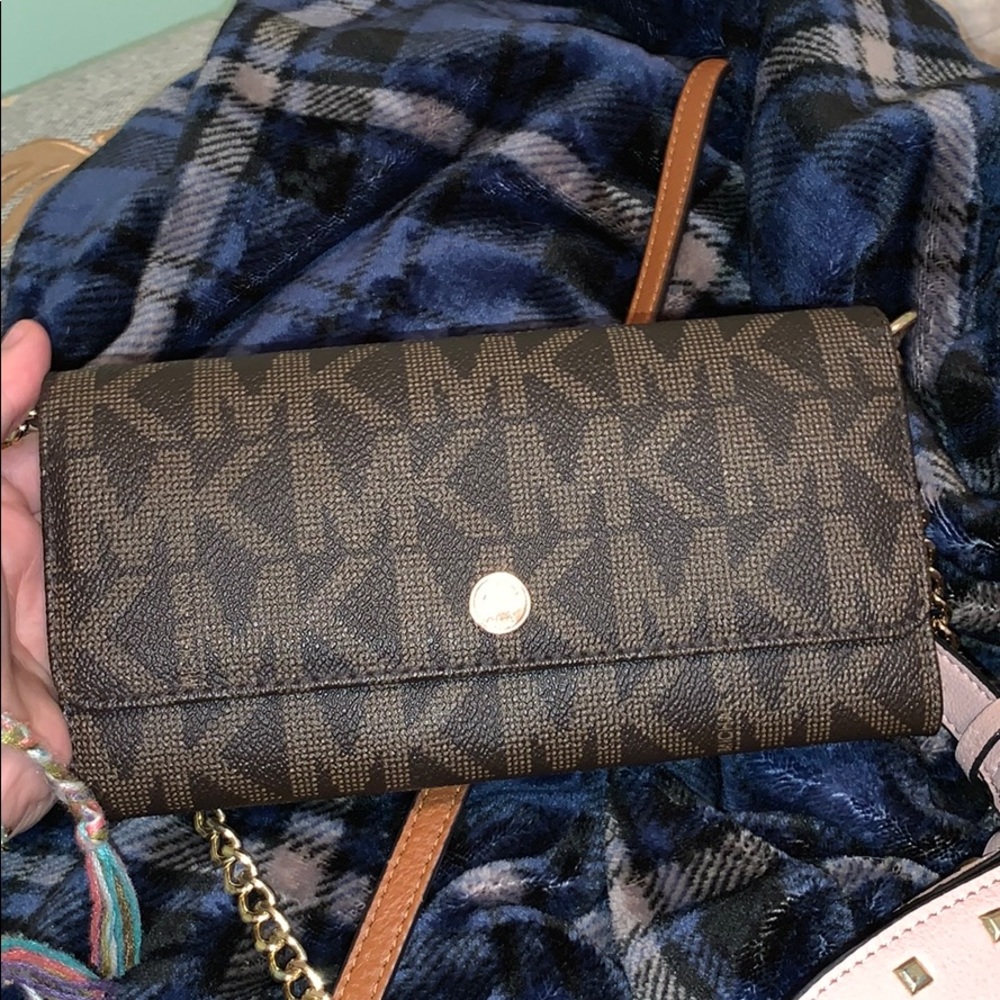 MK cross body & transitions to a wallet!